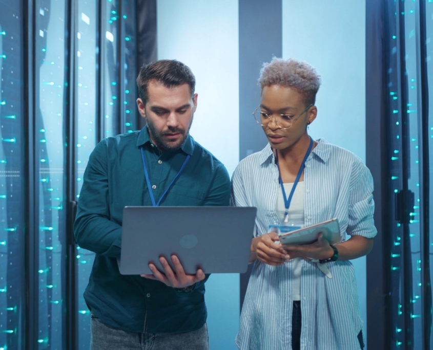Two people discussing in data center